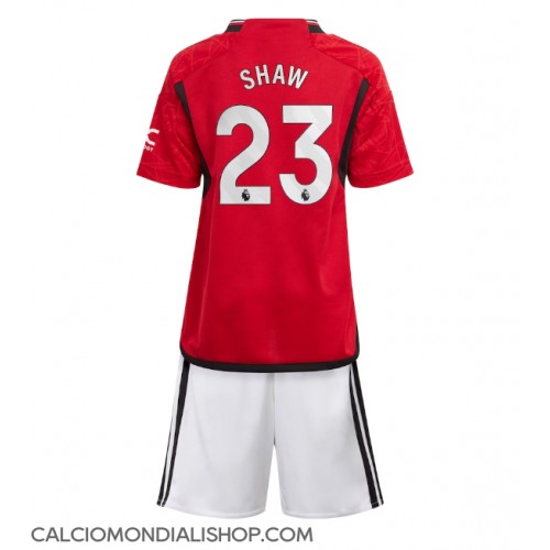 Maglie da calcio Manchester United Luke Shaw #23 Prima Maglia Bambino 2023-24 Manica Corta (+ Pantaloni corti)